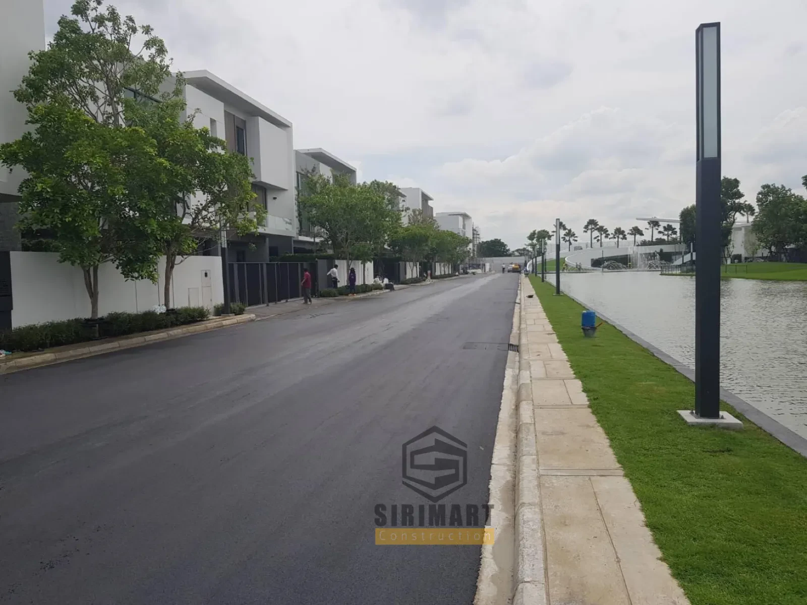 งานลาดยางมะตอย ถนนหมู่บ้านนันทวัน
